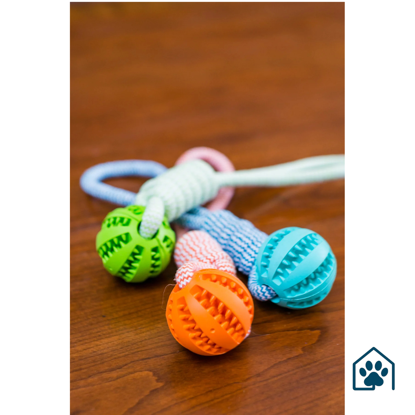 Durable Rubber Chew Ball with Cotton Rope – Tug & Play Toy for Dogs